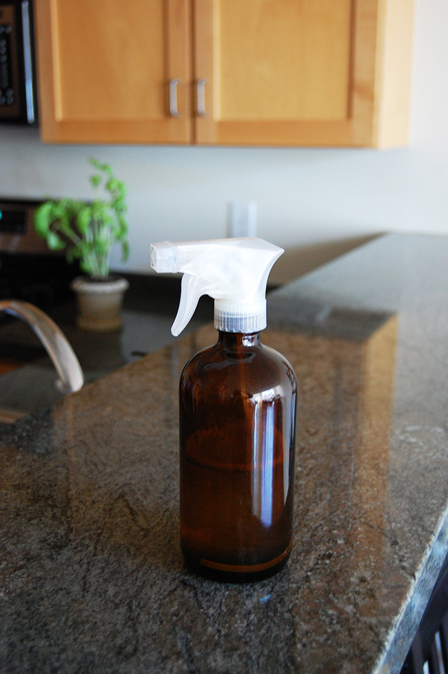 DIY granite countertop cleaner recipe using only dish soap, rubbing alcohol, essential oil, and water