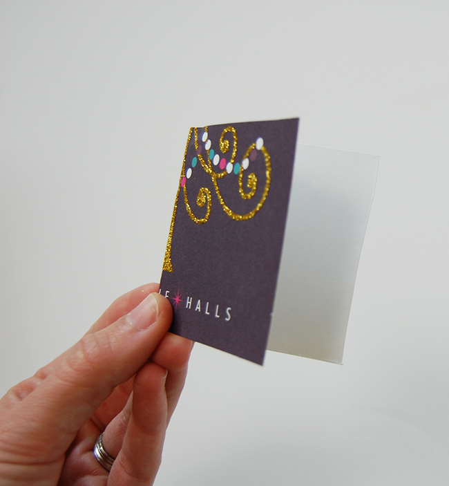 Recycled gift wrap ideas - holiday card transformed into a gift tag