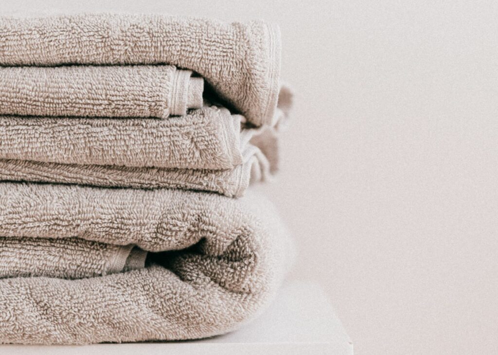 Use dry towels to blot excess moisture from wet carpet.
