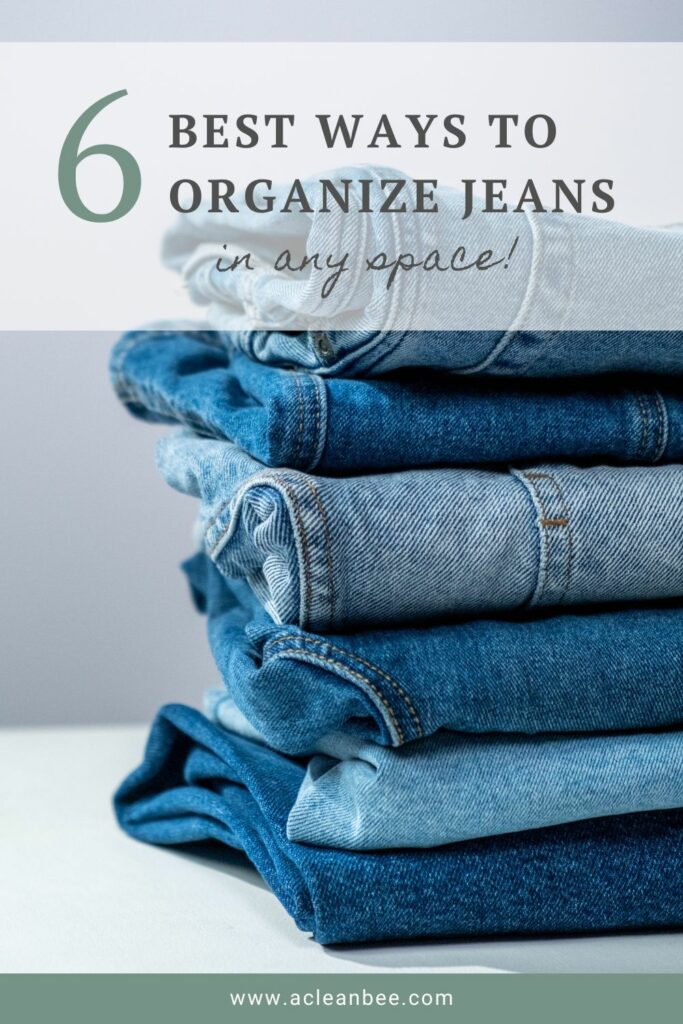 Pile of denim jeans with text overlay 6 best ways to organize jeans in any space - How to organize jeans