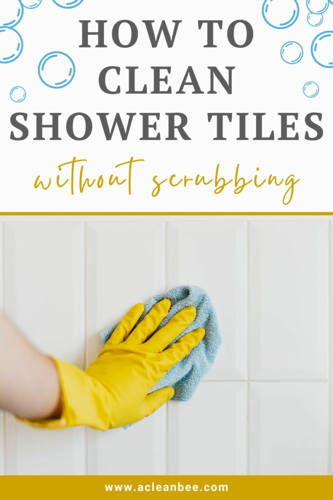 Person cleaning shower tiles with text overlay How To Clean Shower Tiles Without Scrubbing